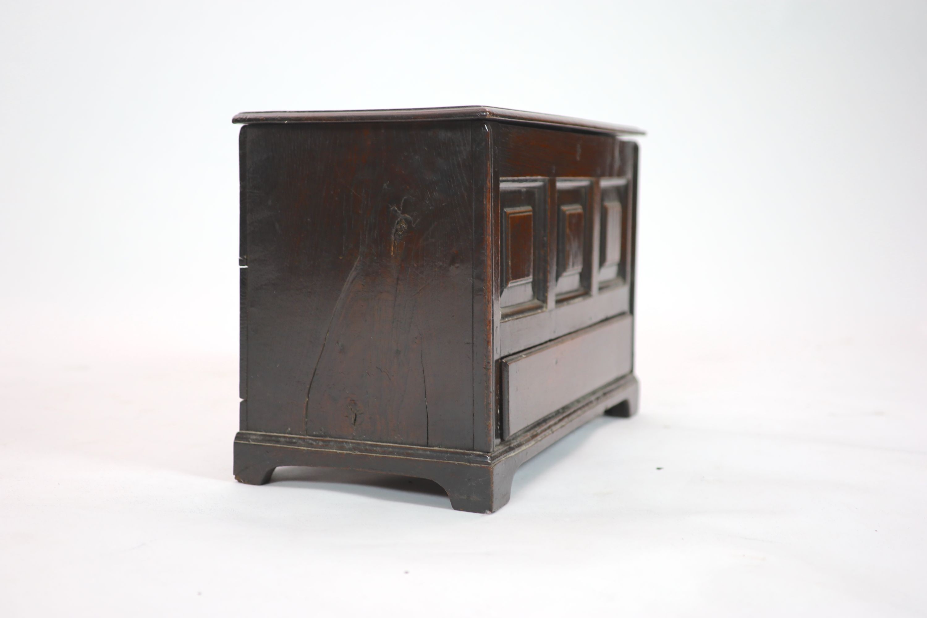 An 18th century Welsh oak coffer bach, H 39cm. W 61cm. D 29cm.